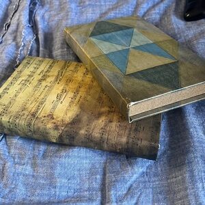 2 fake books for decoration . actually boxes . used . in good condition.